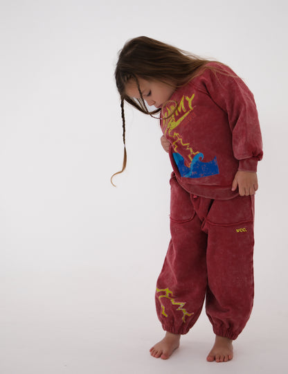 red stormy acid wash pant