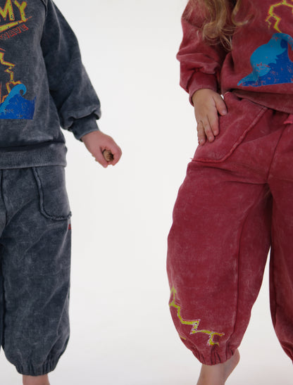 red stormy acid wash pant